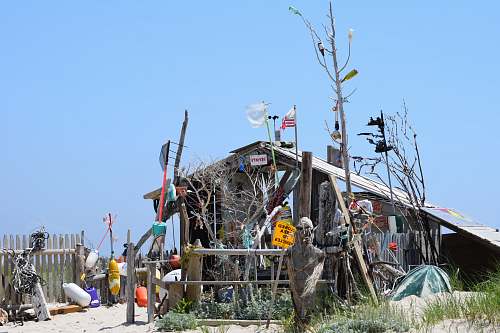 rural wooden house at beach during daytime nature