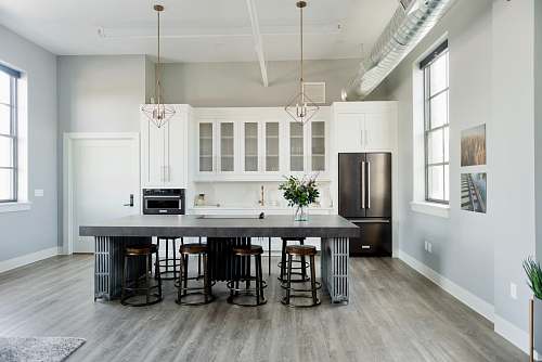 room black wooden table and chairs kitchen island