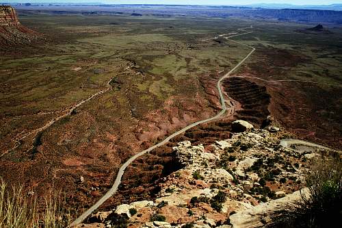 nature photograph of hills and plains on daylight outdoors