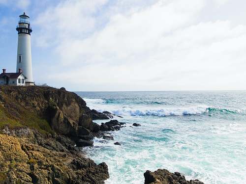 california photo of lighthouse on cliff beacon