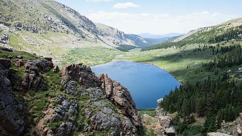 outdoors body of water near mountains water