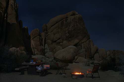 outdoors brown firepit brown rock formation fire