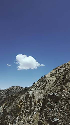 outdoors mountains under clouds mountain