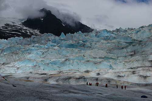 mountain people walking on ice outdoors