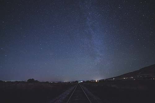 universe train rail during night time mendon