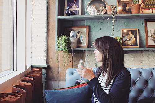 human woman holding wine glass people