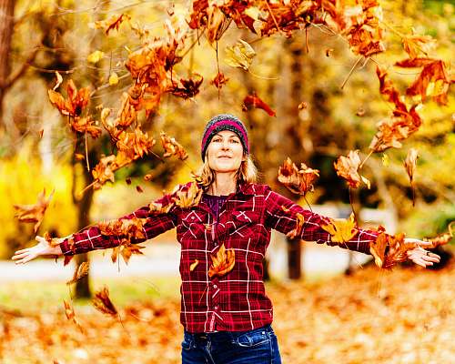 leaf man in red and white checked jacket standing apparel