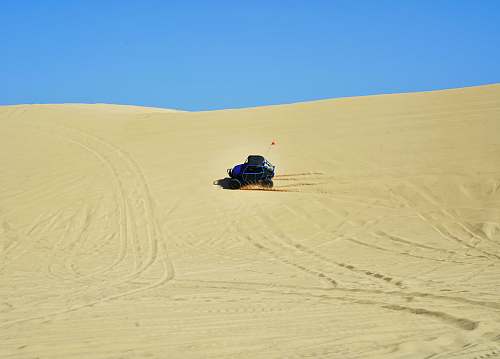 dune blue dune buggy on the desert desert