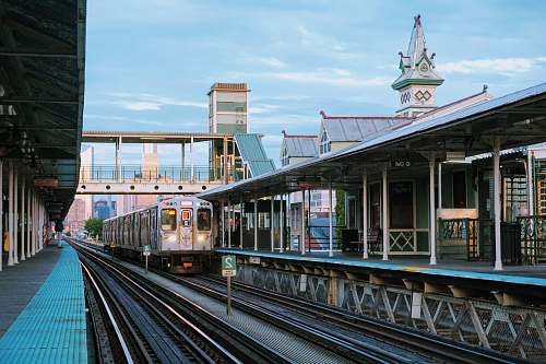 vehicle gray metal train near station during daytime chicago