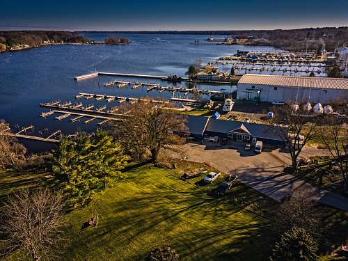 coast aerial photography of dock during daytime ocean
