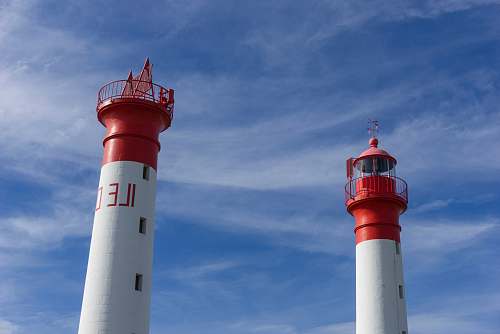  two red-and-white lighthouses 