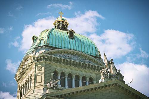building architectural photo of a white and green building] dome