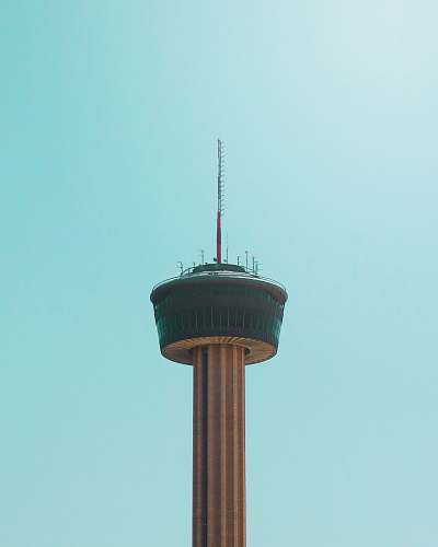 building black and white tower during daytime tower