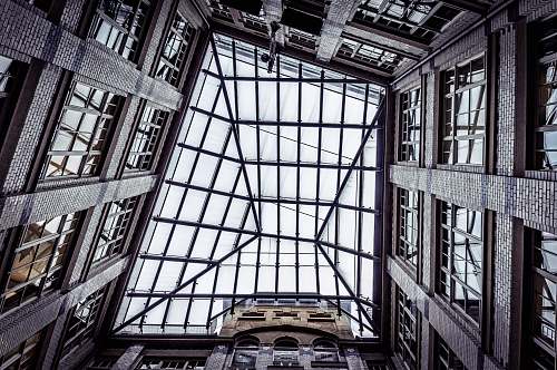 building bottom view of glass building structure