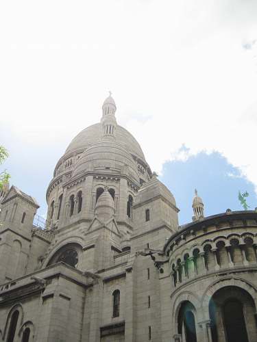 building brick cathedral under cloudy sky dome