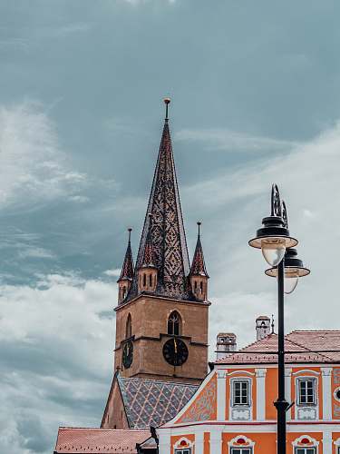 building brown and white castle spire