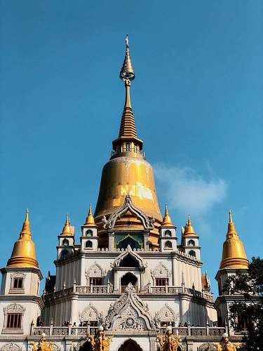 building brown and white temple spire
