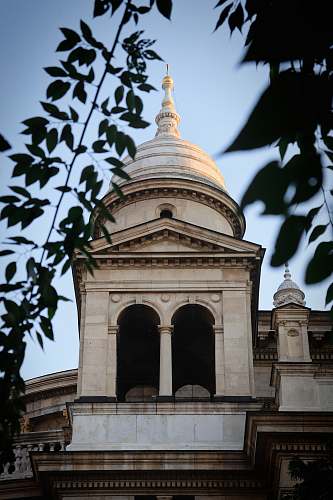 building brown painted concrete tower dome