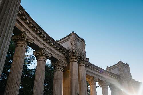building brown pillars pillar