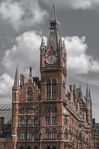 building building with clock tower during day tower