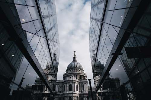 cathedral church between mirror-curtain buildings london