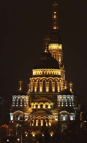 building gold building during nighttime dome