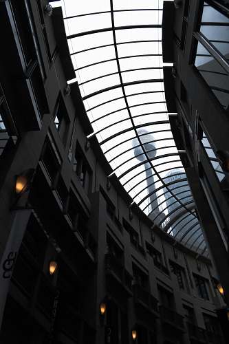 building gray and black concrete building during daytime window
