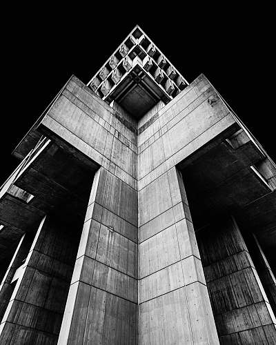 building grayscale photo of concrete building black-and-white