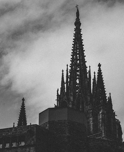 black-and-white grayscale photography of brown building tower