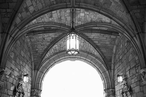 building grayscale photography of concrete brick building black-and-white