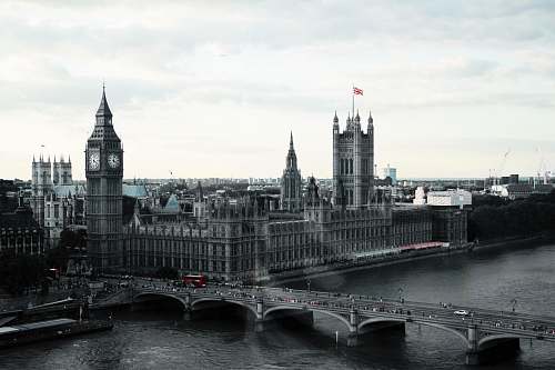 building grayscale photography of Westminster Palace tower