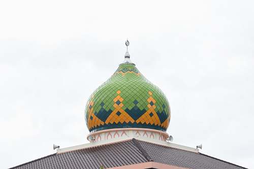 building green and yellow temple dome