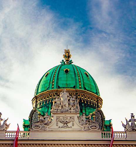 building green dome building under cloudy sky dome