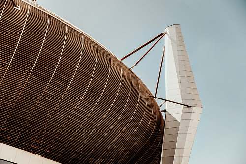 building grey coliseum with mesh planetarium