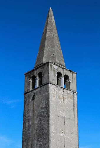 building grey concrete tower during daytime tower