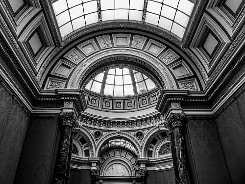 building greyscale photography of concrete building black-and-white