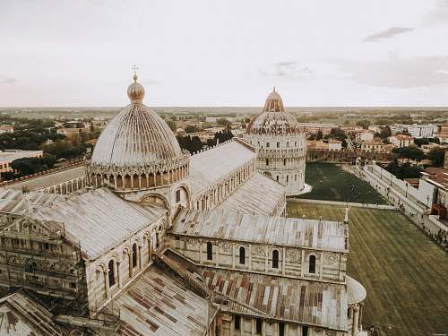 building high-angle photo of white and brown concrete mosque dome