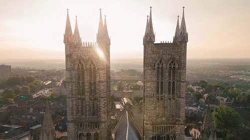 building high angle view photography of brown buildings tower