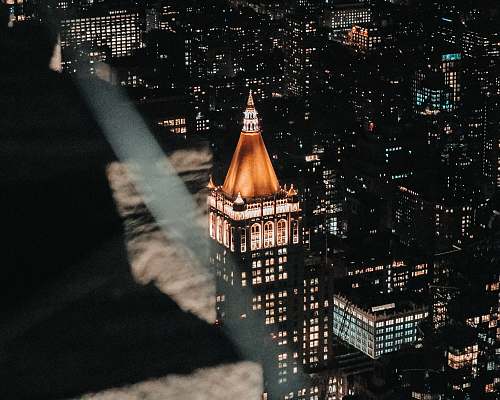 building high rise building view at night spire