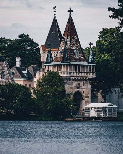 building house near body of water spire
