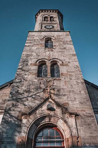 building low-angle photography of brick cathedral tower
