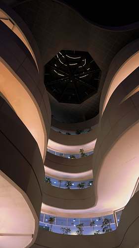 building low-angle photography of building interior staircase