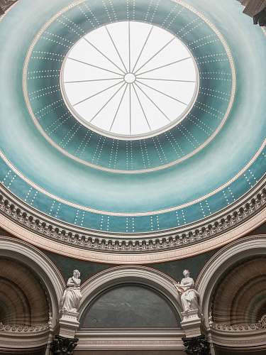 building low-angle photography of domed building window