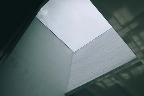 building low-angle photography of gray concrete interior grey