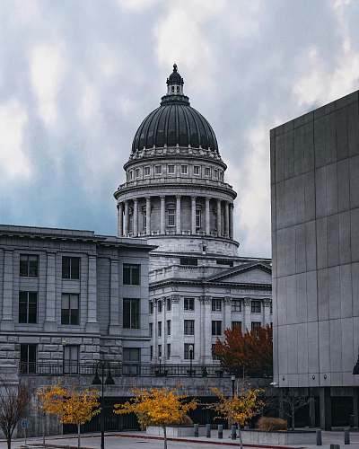 building low angle photography of gray dome building dome