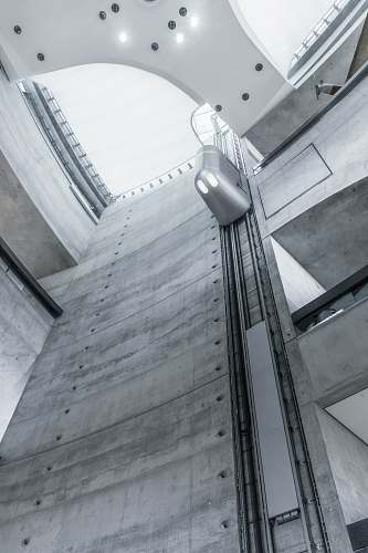 building low-angle photography of high-rise building window