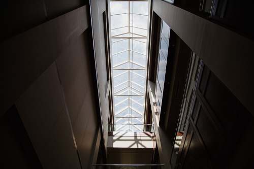 building low angle photography of inside building skylight