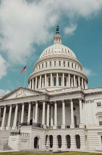 building low-angle photography of U.S. Capitol dome