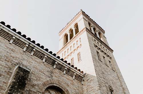 building low angle view of brick building during daytime tower