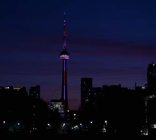 building needle tower at night spire
